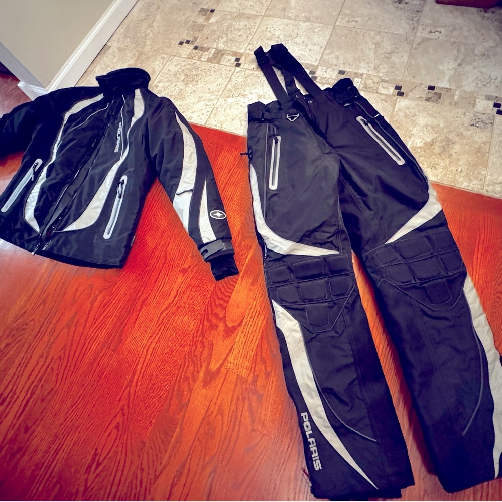 Like new! Used maybe once. Snow mobile bib and jacket.